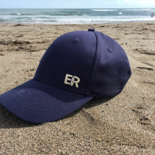 baseball hat on beach